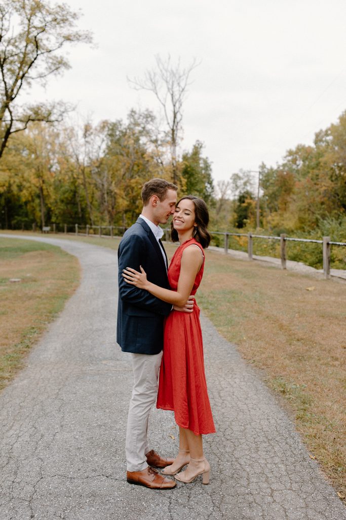 man kissing woman on the cheek