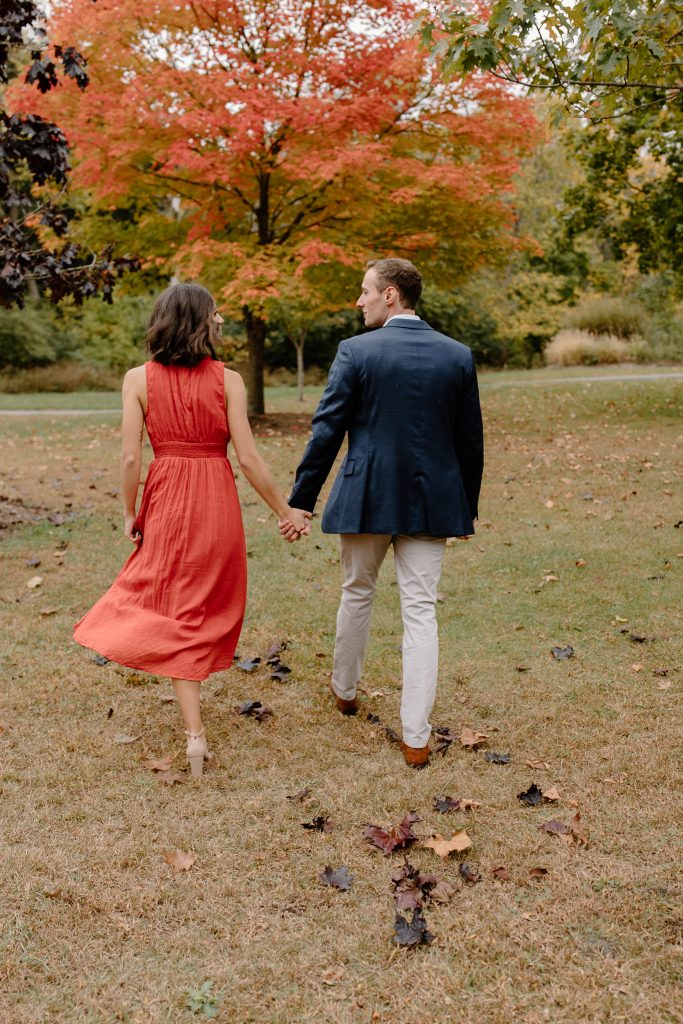 portrait of man and woman in red dress