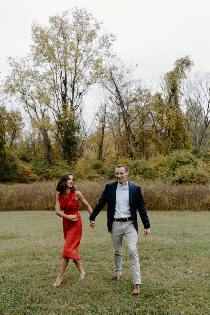 man and woman running towards camera