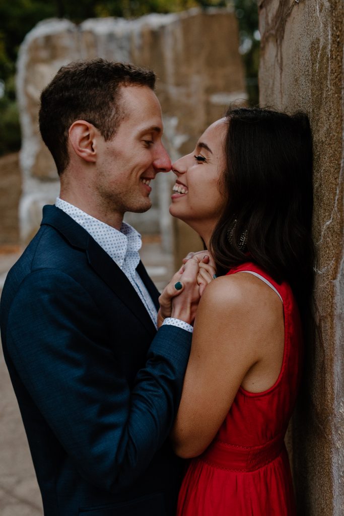 man and woman looking at each other smiling